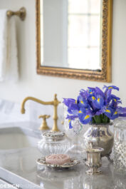 summer refresh bathroom decor with vintage vanity pieces