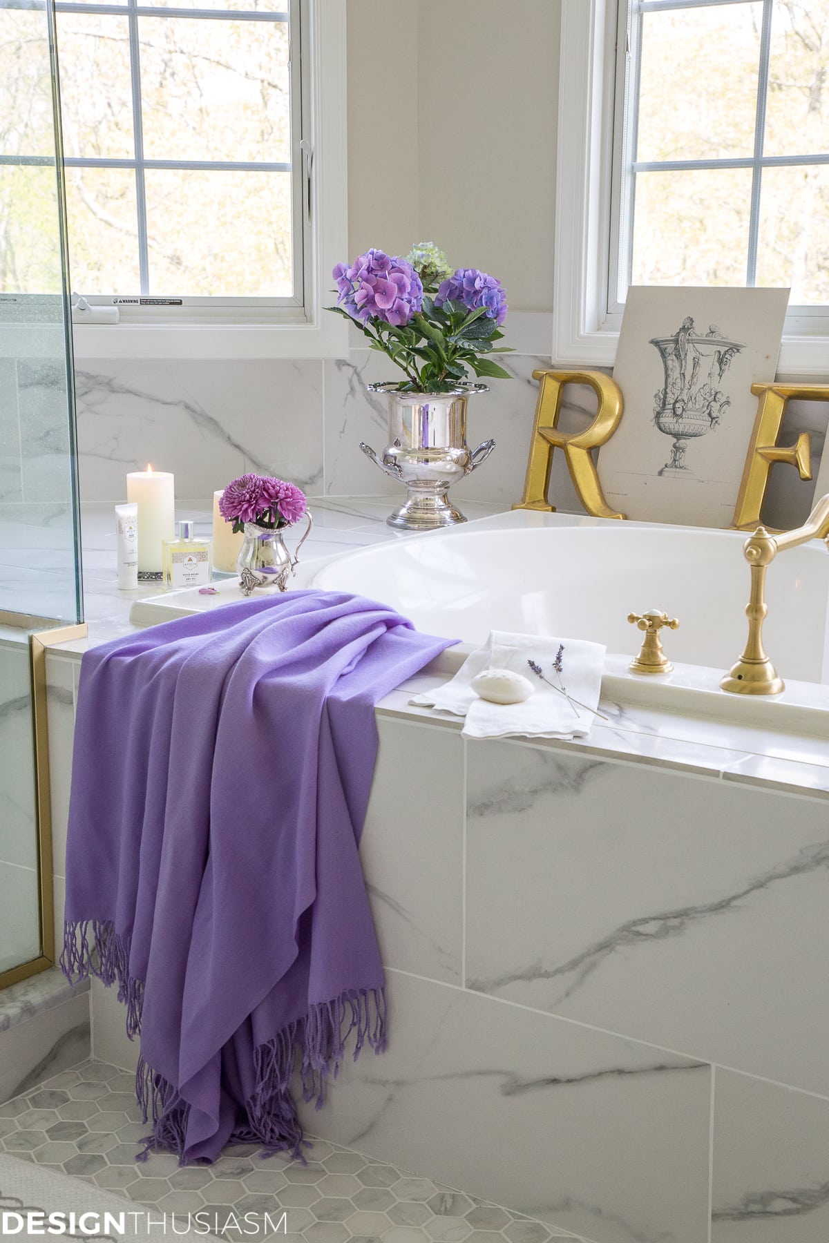 summer refresh bathroom decor with a purple throw