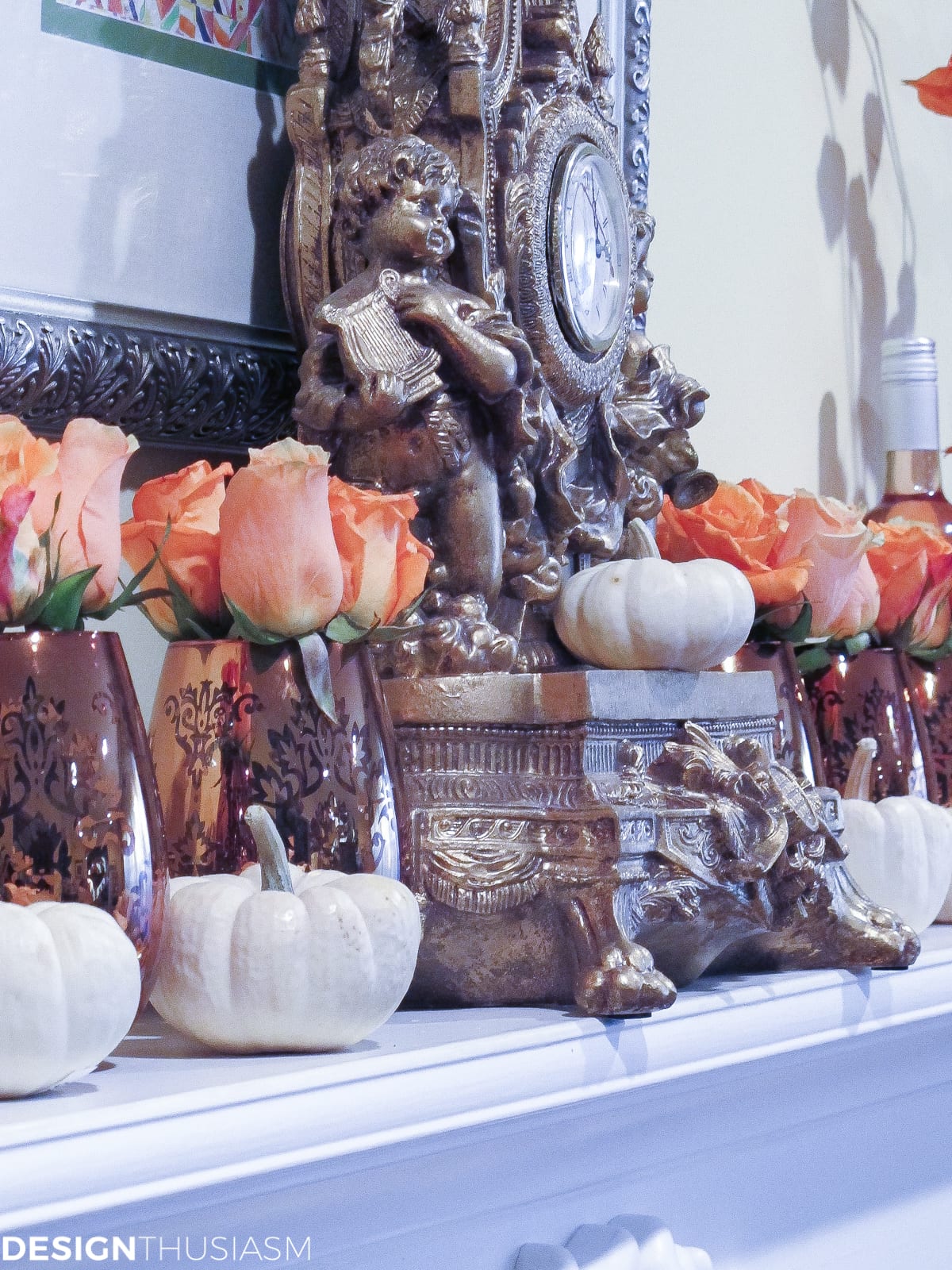 fall mantel with white pumpkins and orange roses