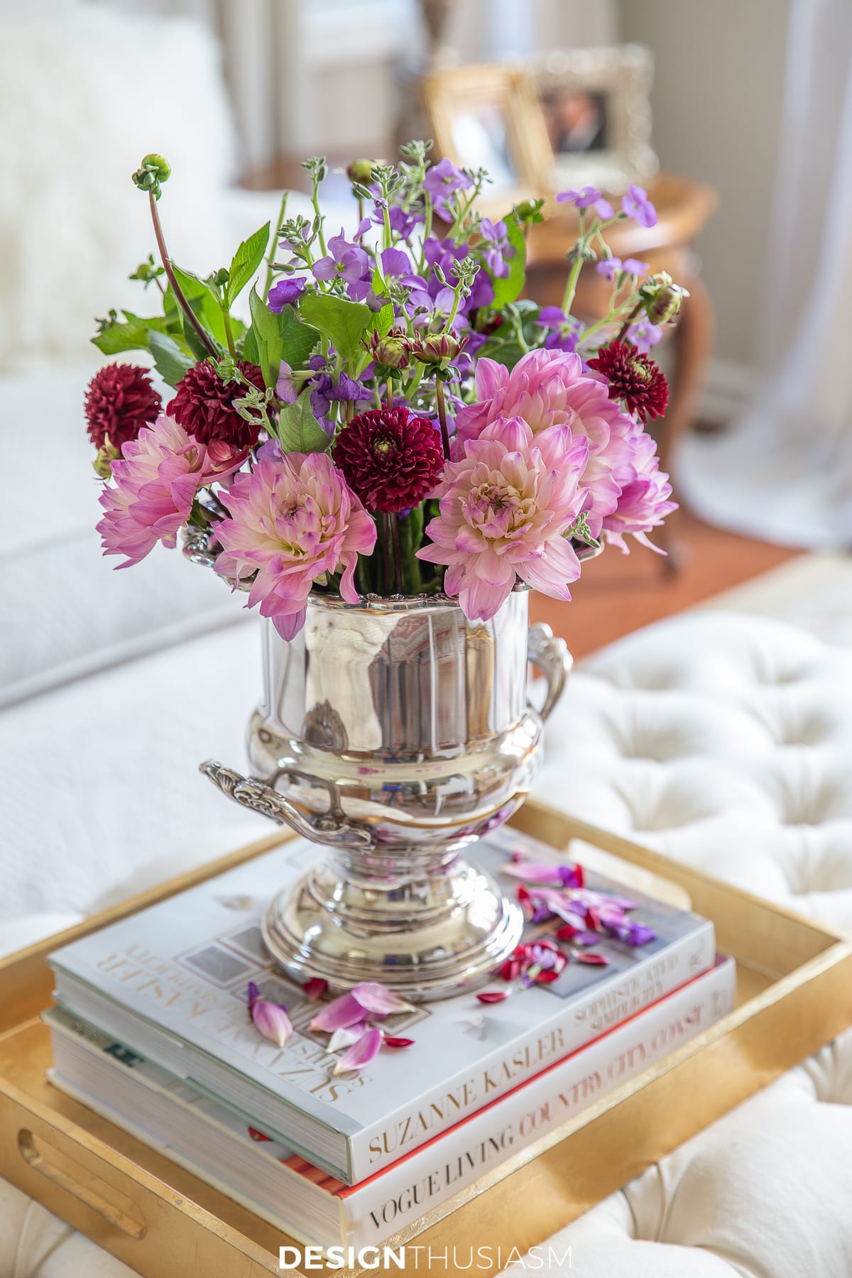 flower arrangement in silver champagne bucket