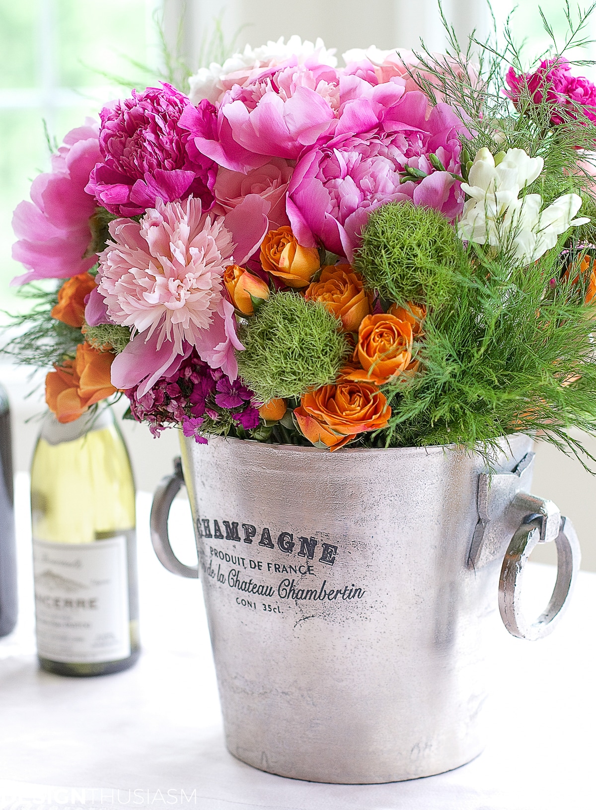 flower arrangement in champagne bucket