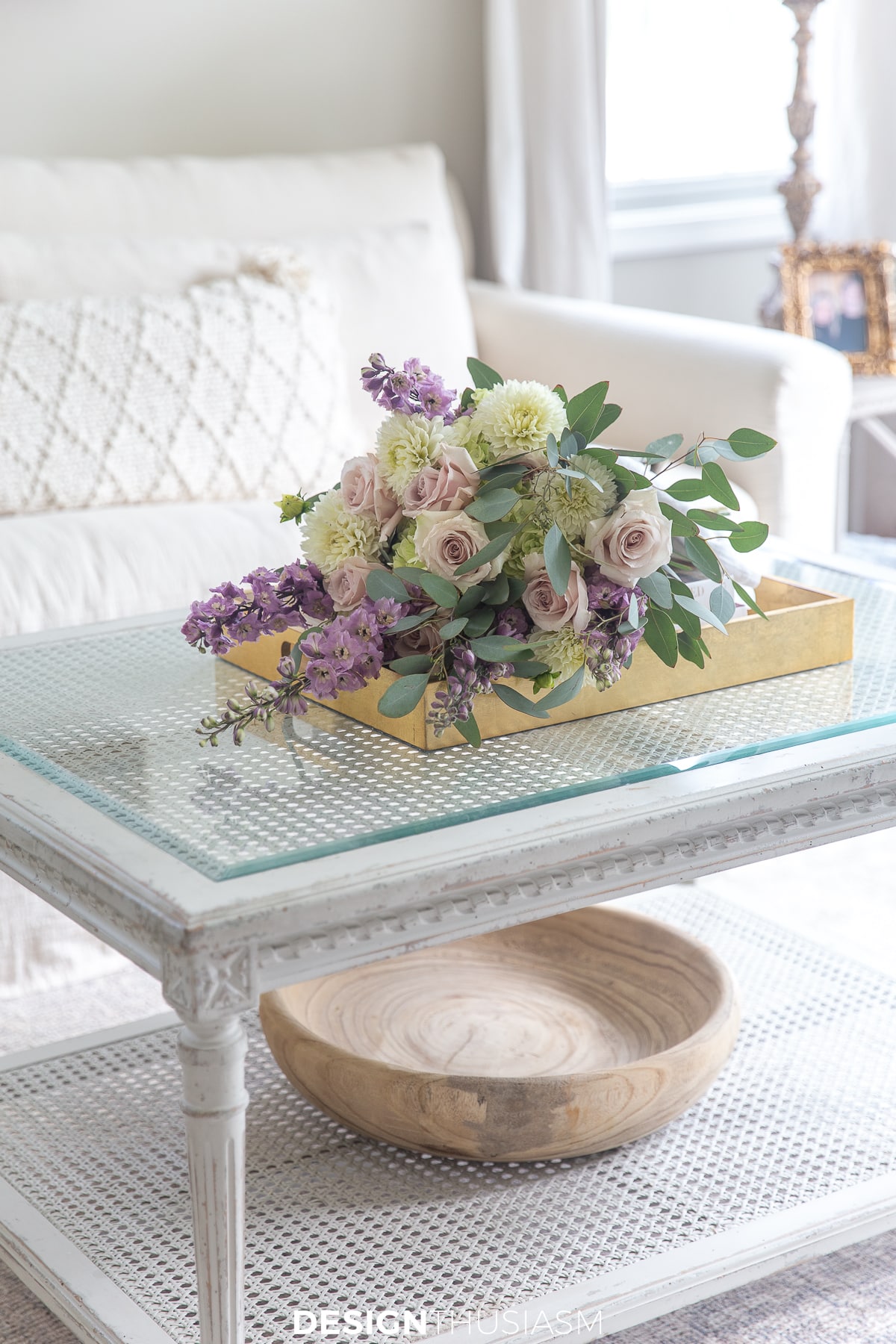 gathered cluster of blooms flower arrangement on tray