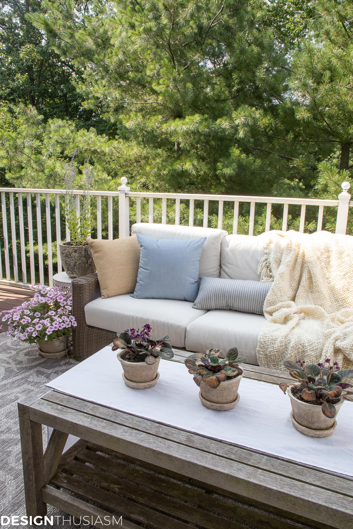 outdoor decor pillows and clay pots