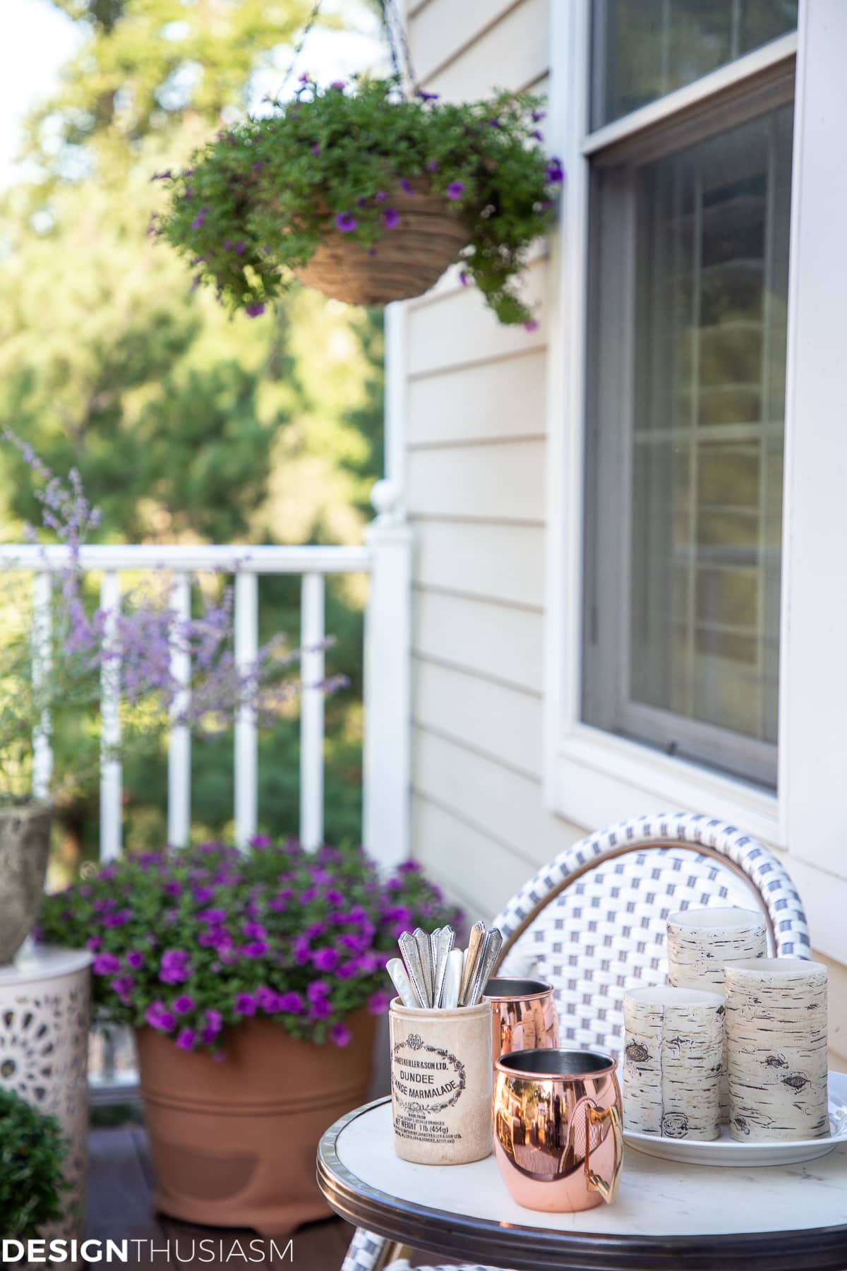 copper moscow mules and bark candles on a french bistro set for fall