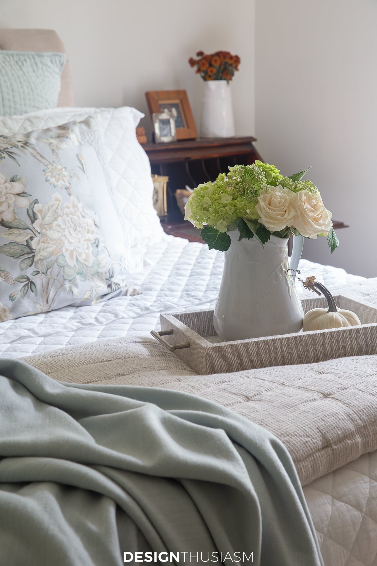 fall guest room floral on the bed