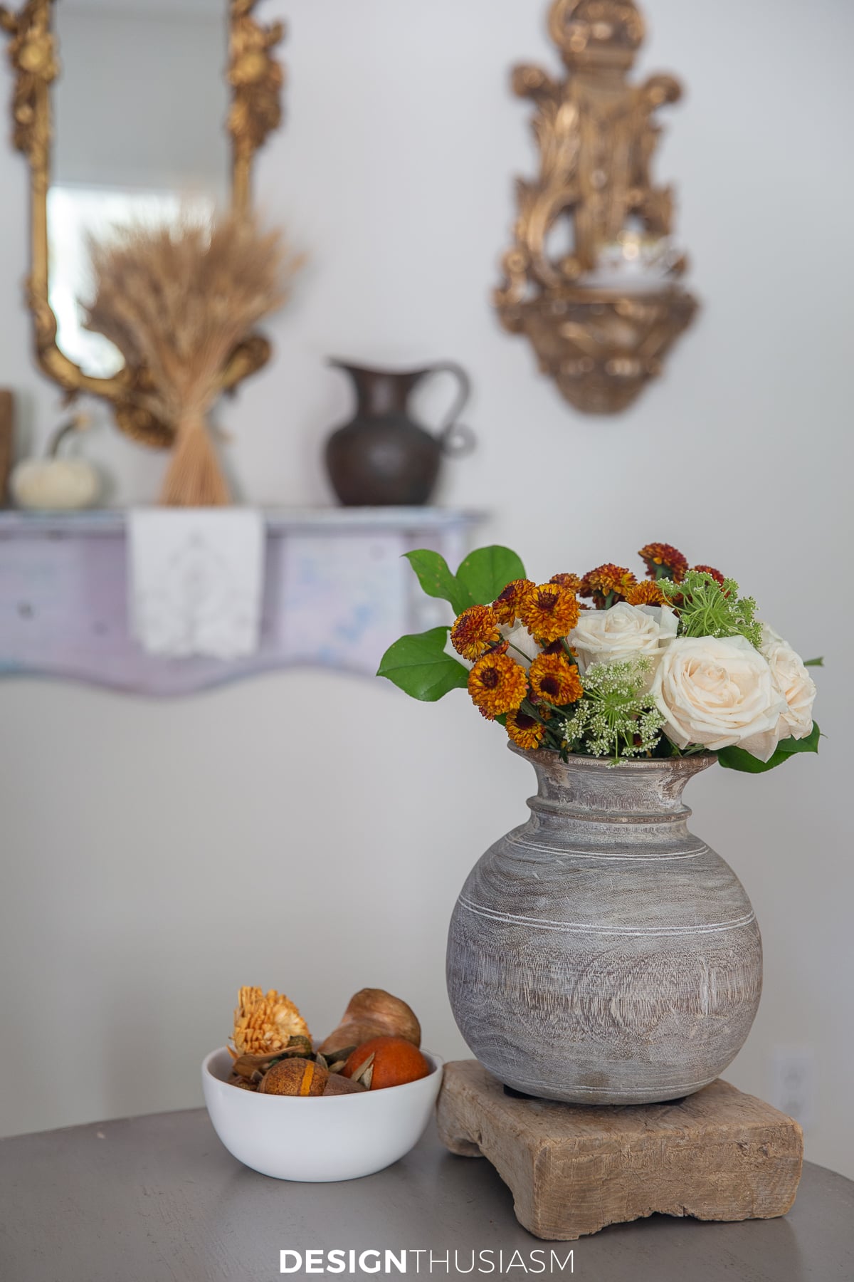 fall flowers on the desk in the study