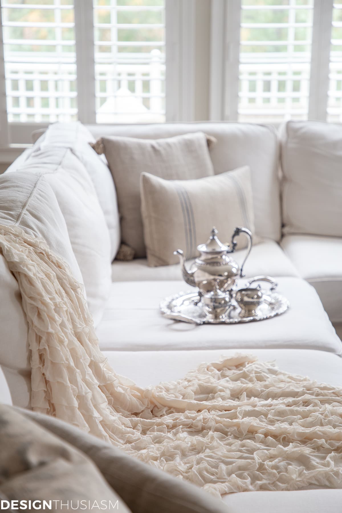 Christmas living room couch with silver tea set
