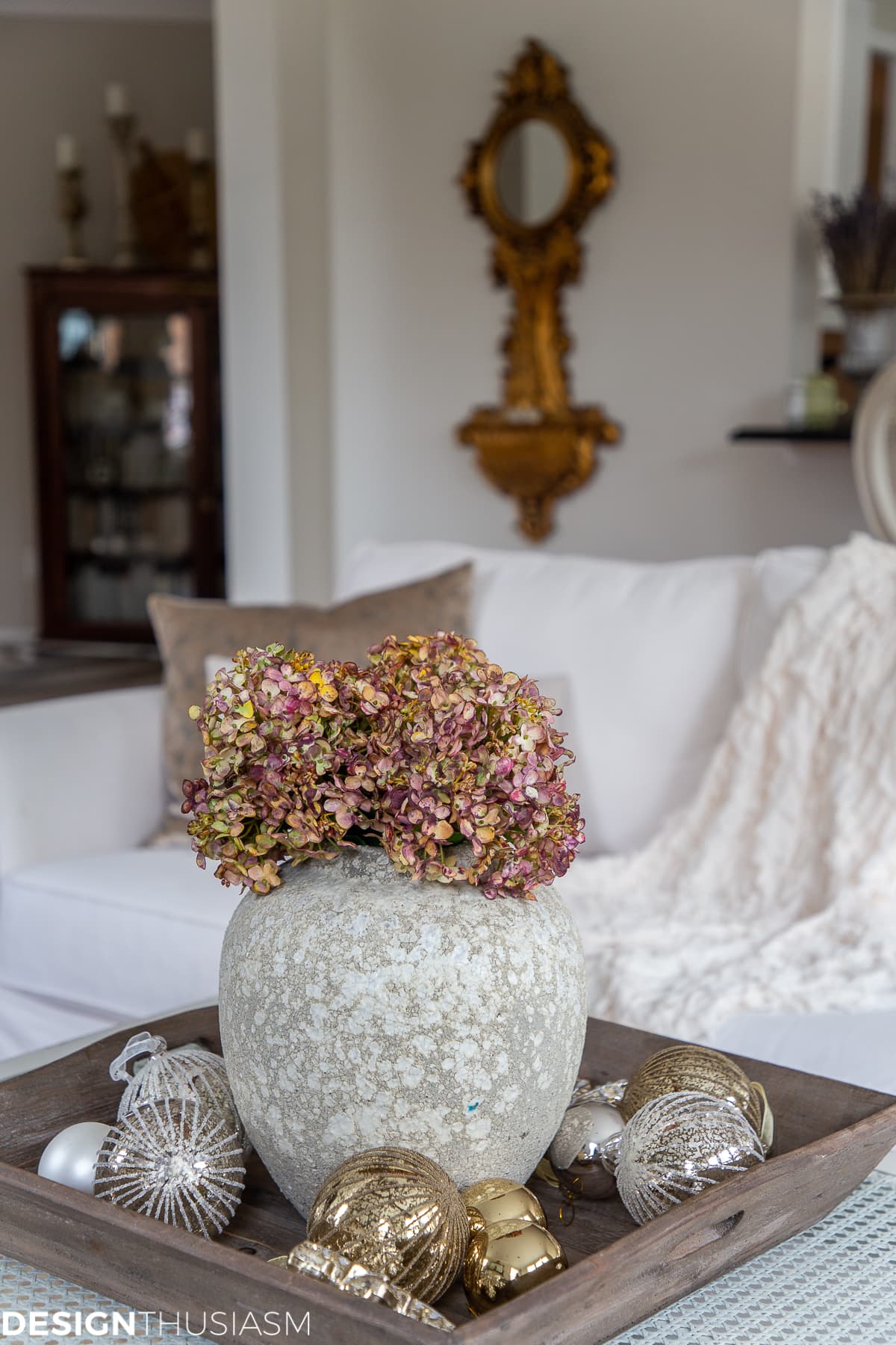 Christmas living room decorating with metallic ornaments in a tray