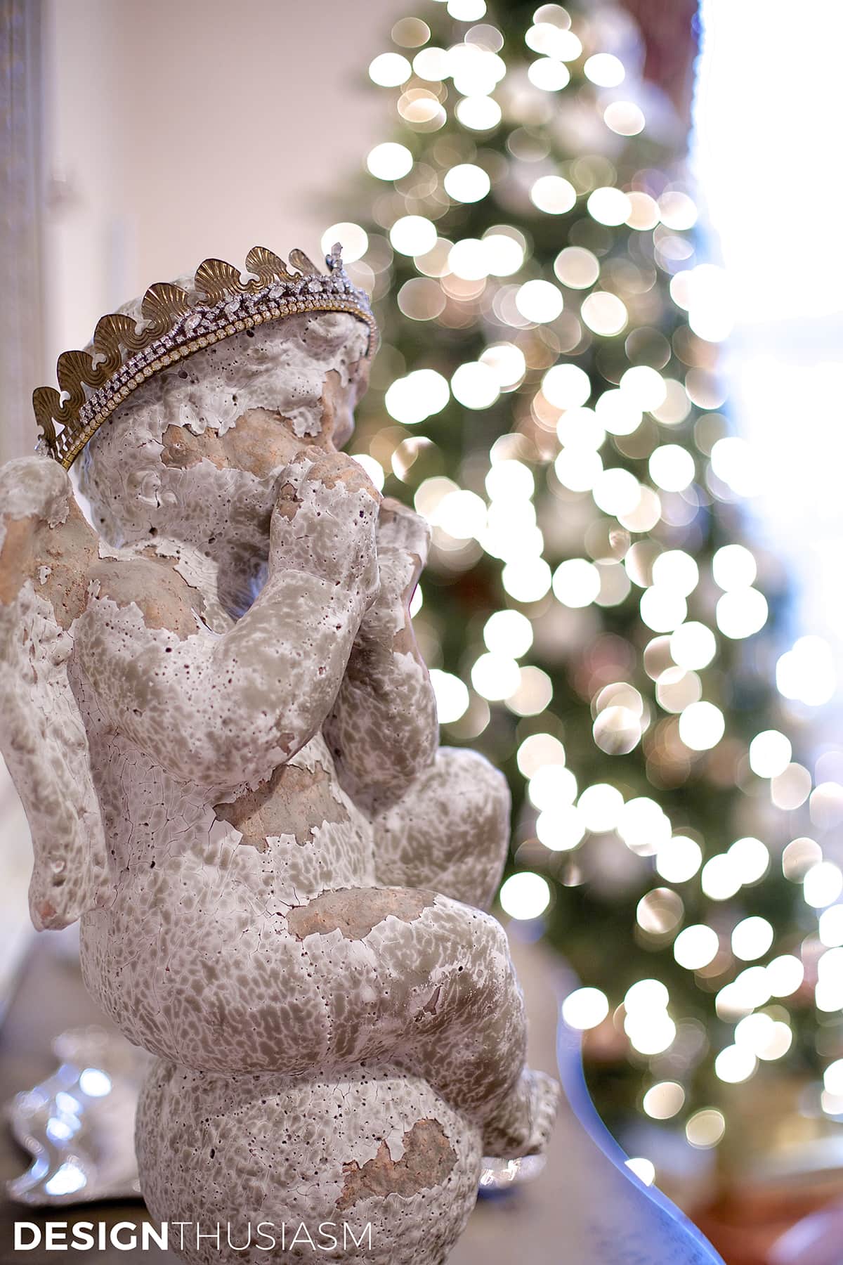 French country cherub with Christmas tree