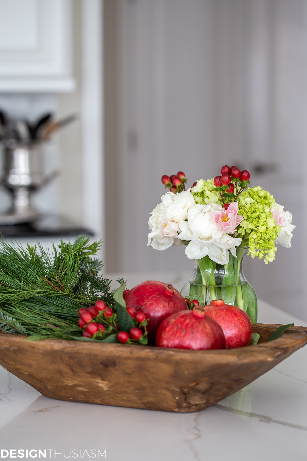dough bowl vignette with flowers and pomegranates