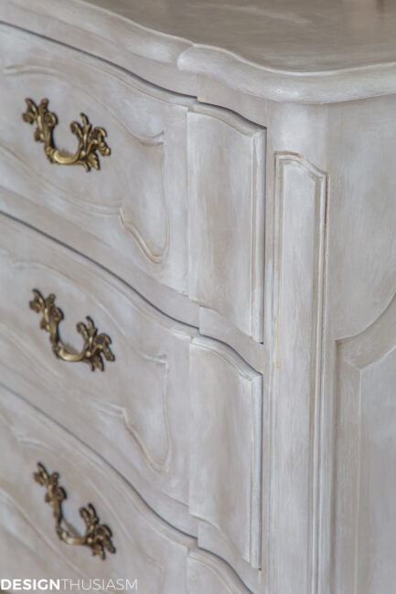 detail closeup of vintage french painted dresser