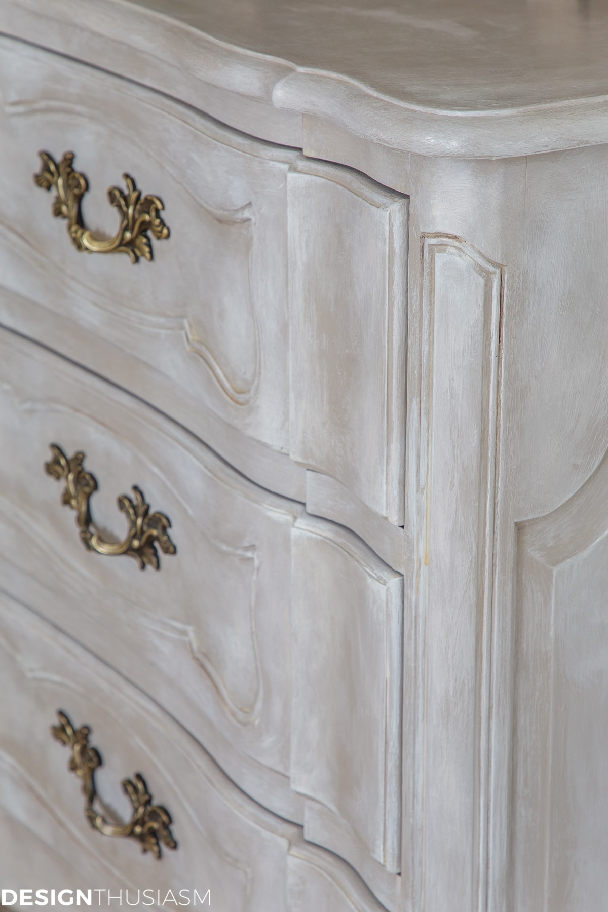 detail closeup of vintage french painted dresser
