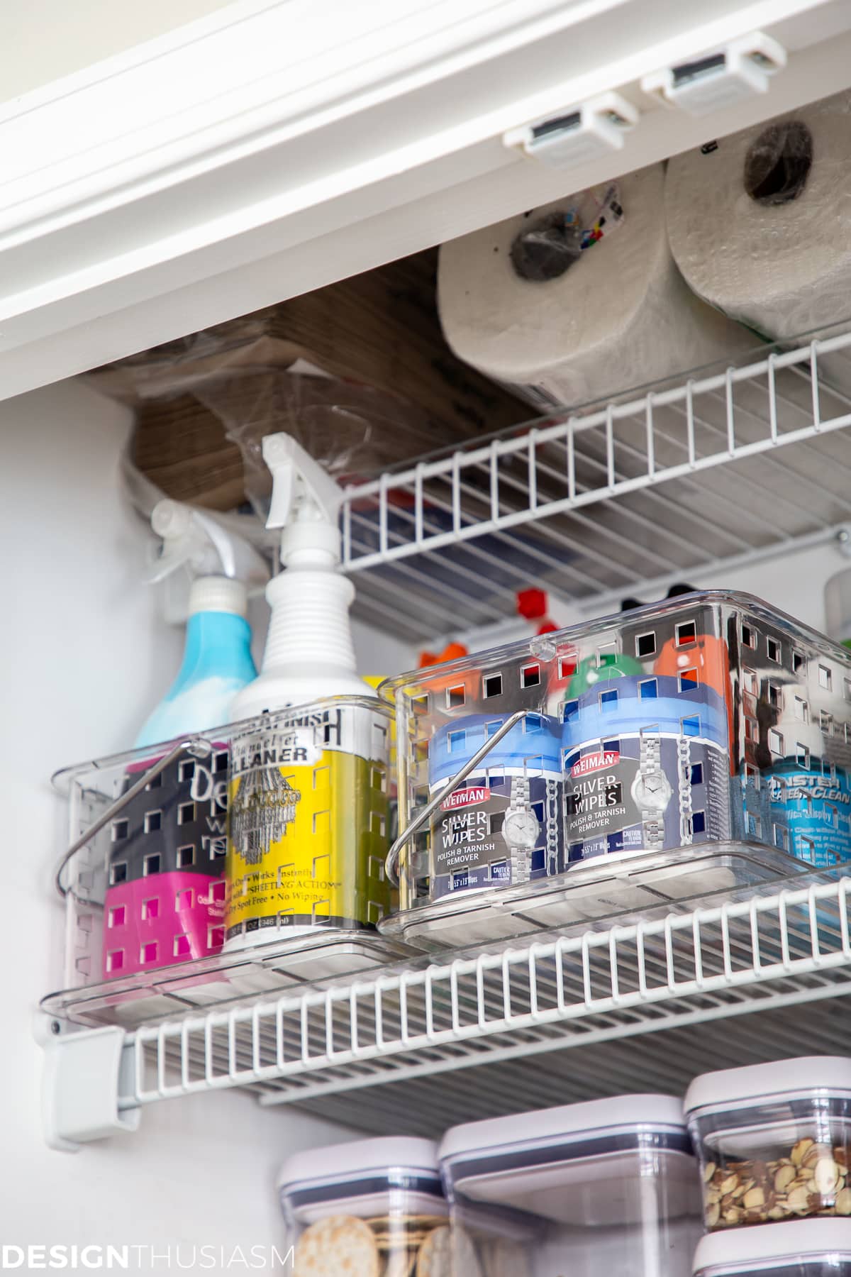 kitchen pantry with organized cleaning supplies