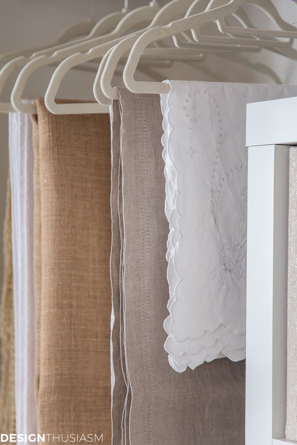 tablecloths and runners in storage closet