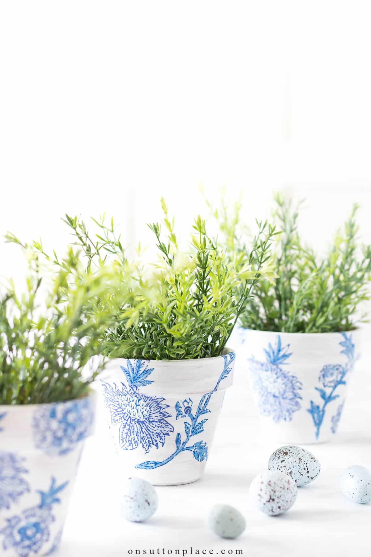 mod podge terra cotta pots chinoisserie with greenery
