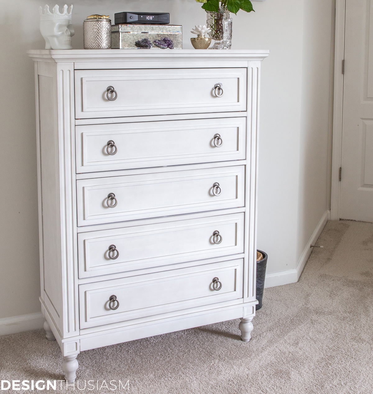 tall narrow chest in white bedroom