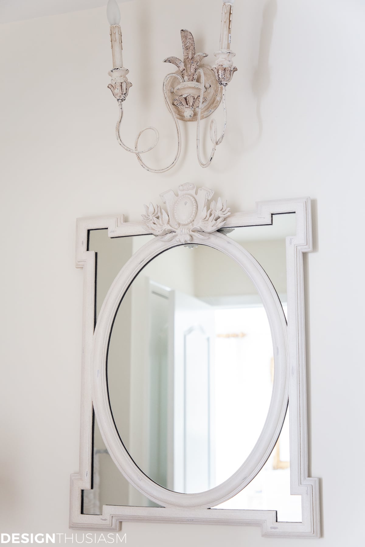 bathroom mirror and sconces