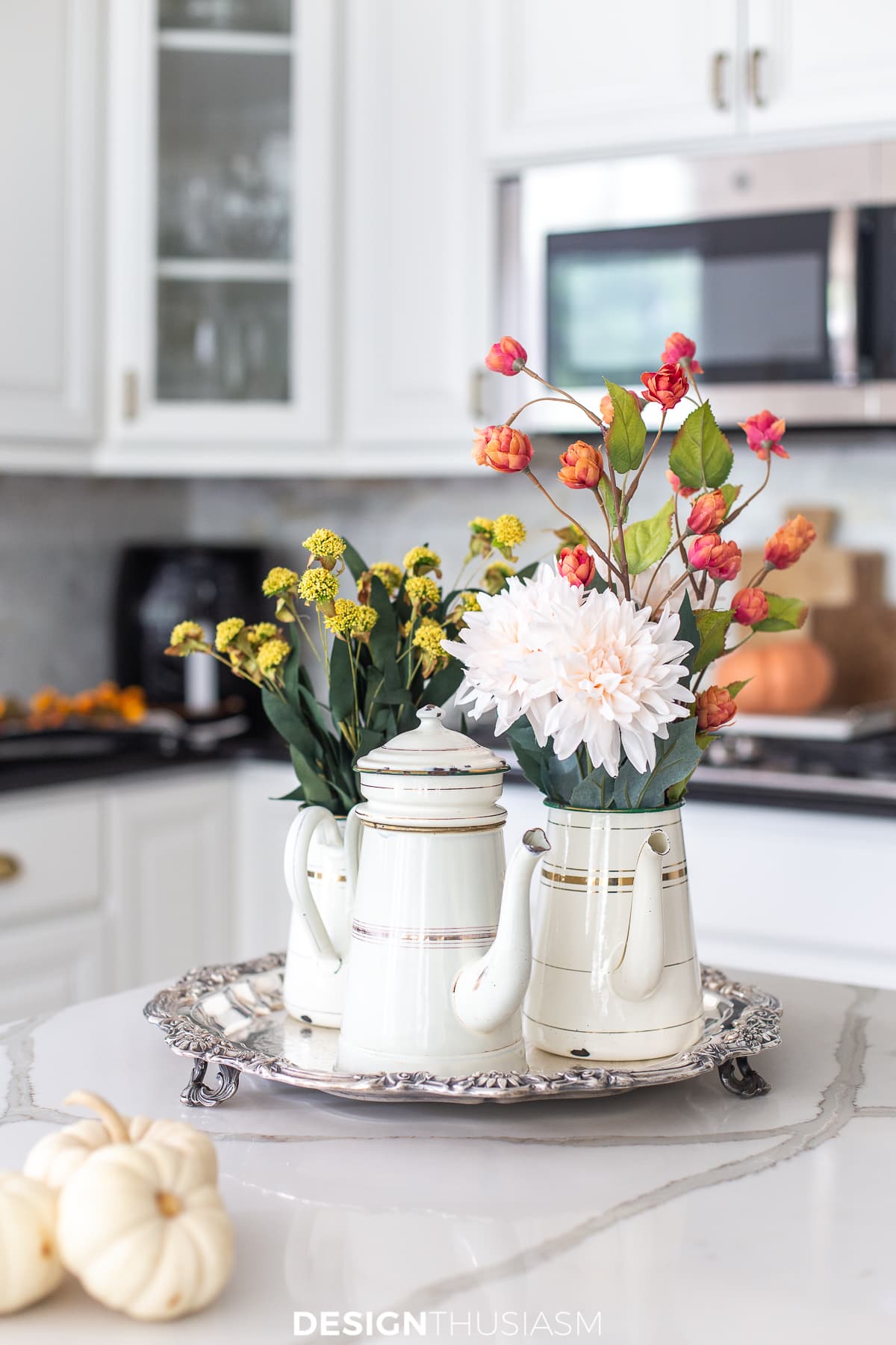 fall flowers in vintage coffee pots