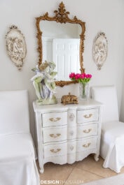 chalk painted chest of drawers in the foyer