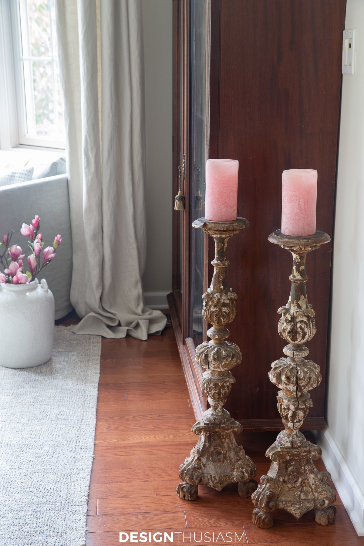 summer living room with pink pillar candles
