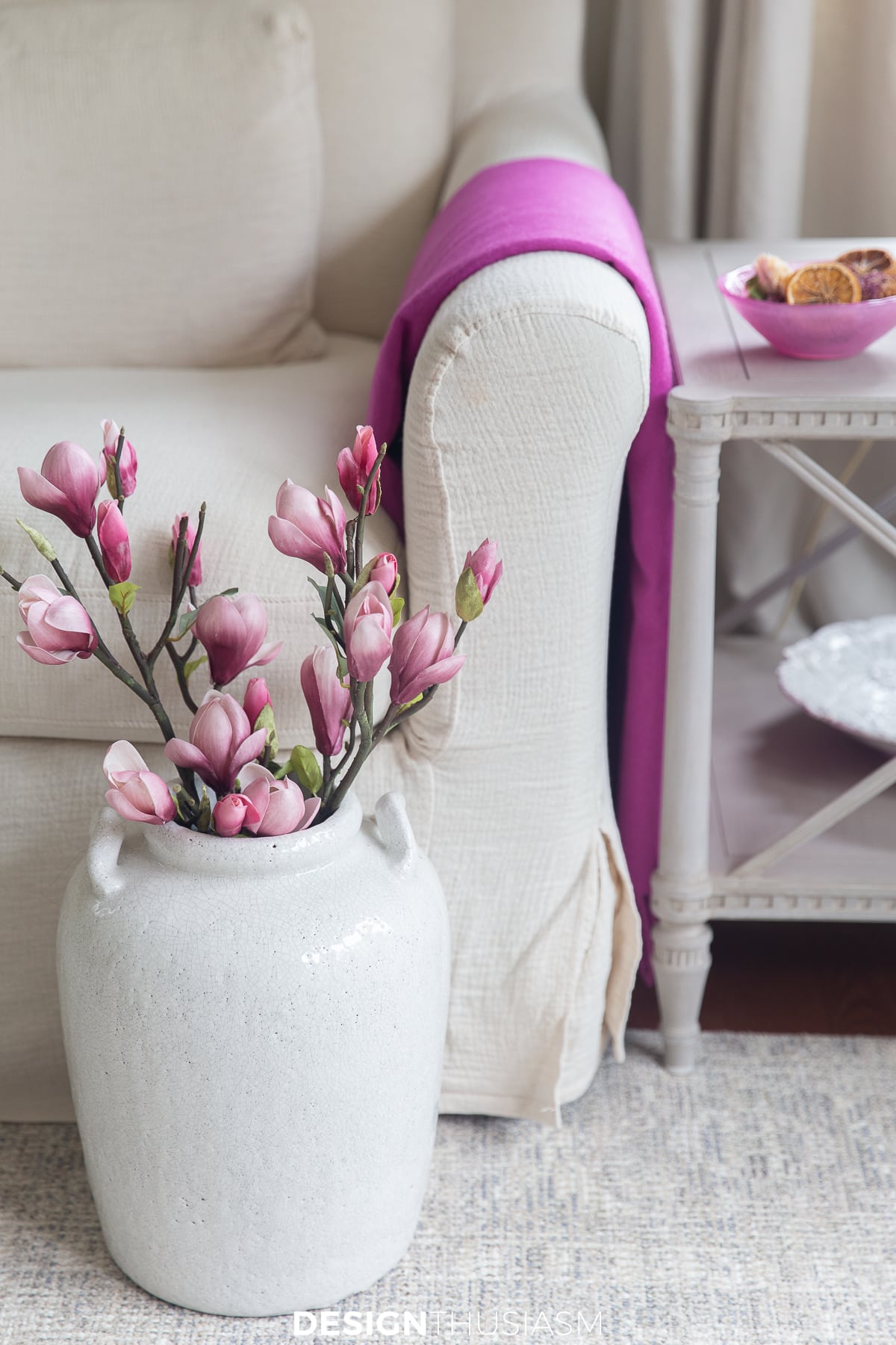 summer living room with magnolia stems