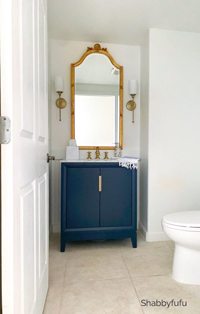 Stylish Powder Room Renovation In Blue