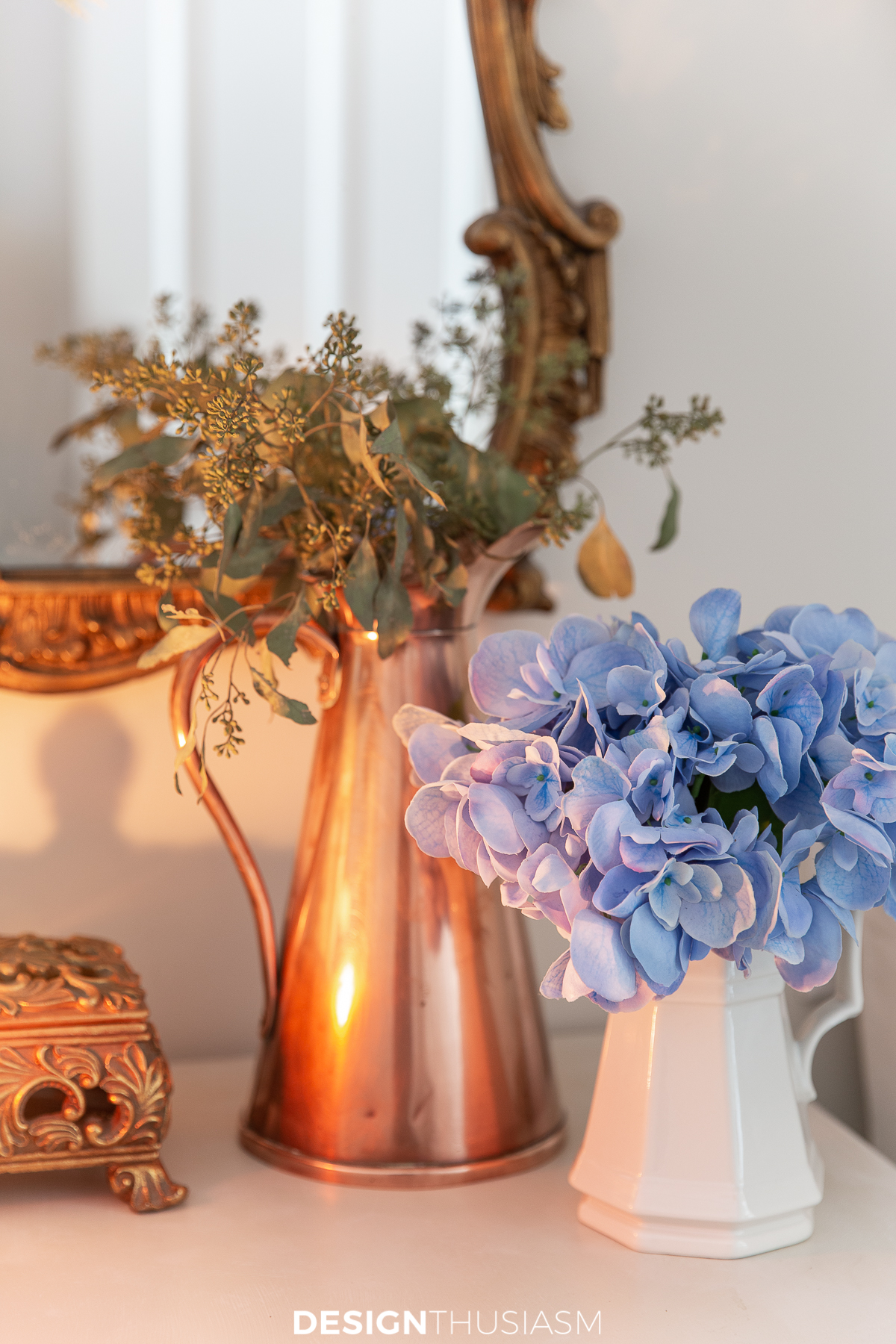 fall entryway copper pitcher