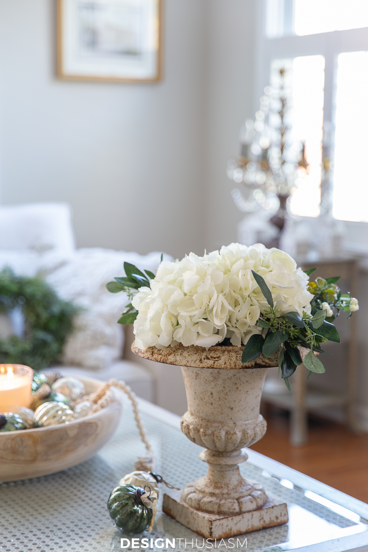 holiday family room with white hydrangeas in vintage planter