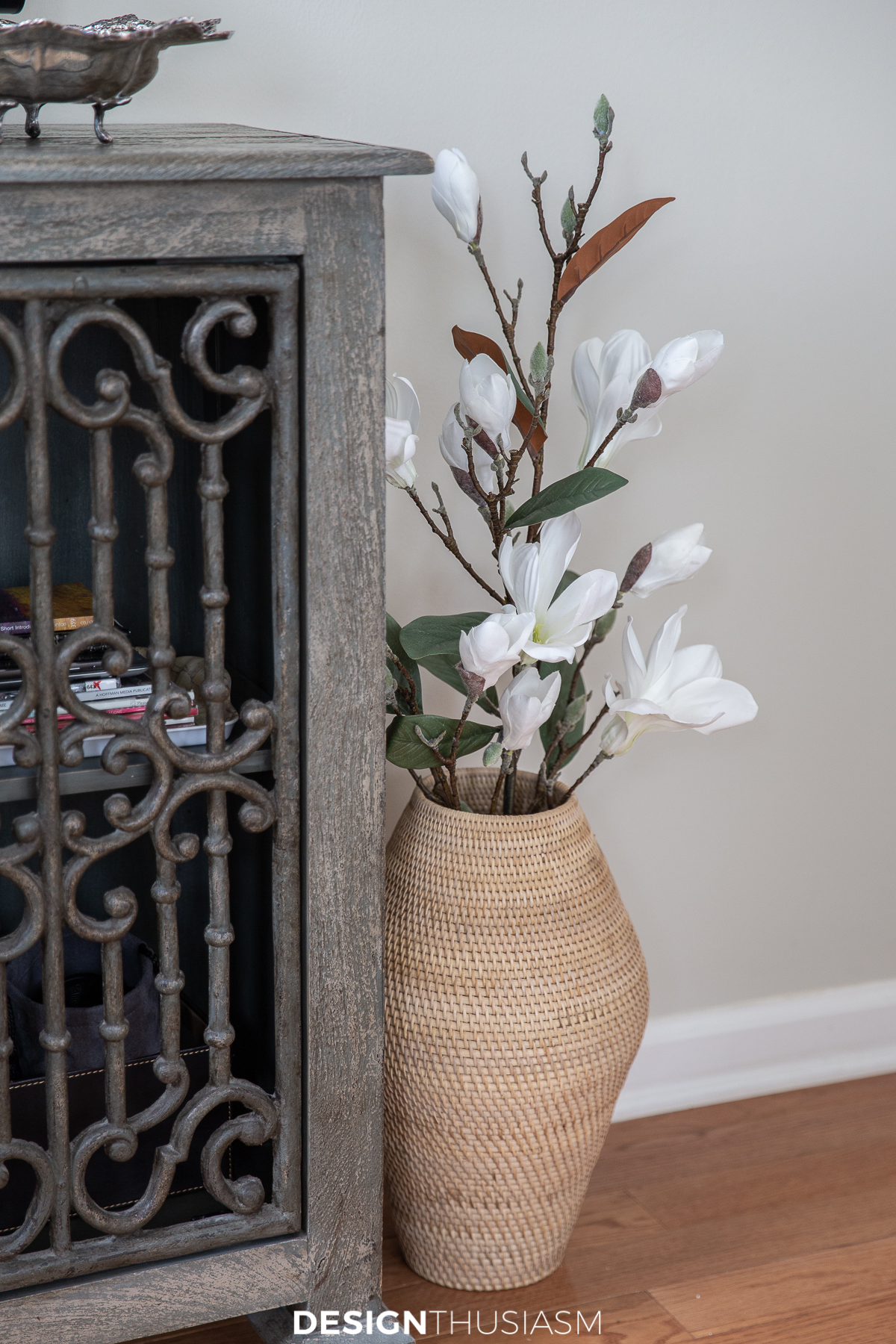 spring decor branches in a rattan vase