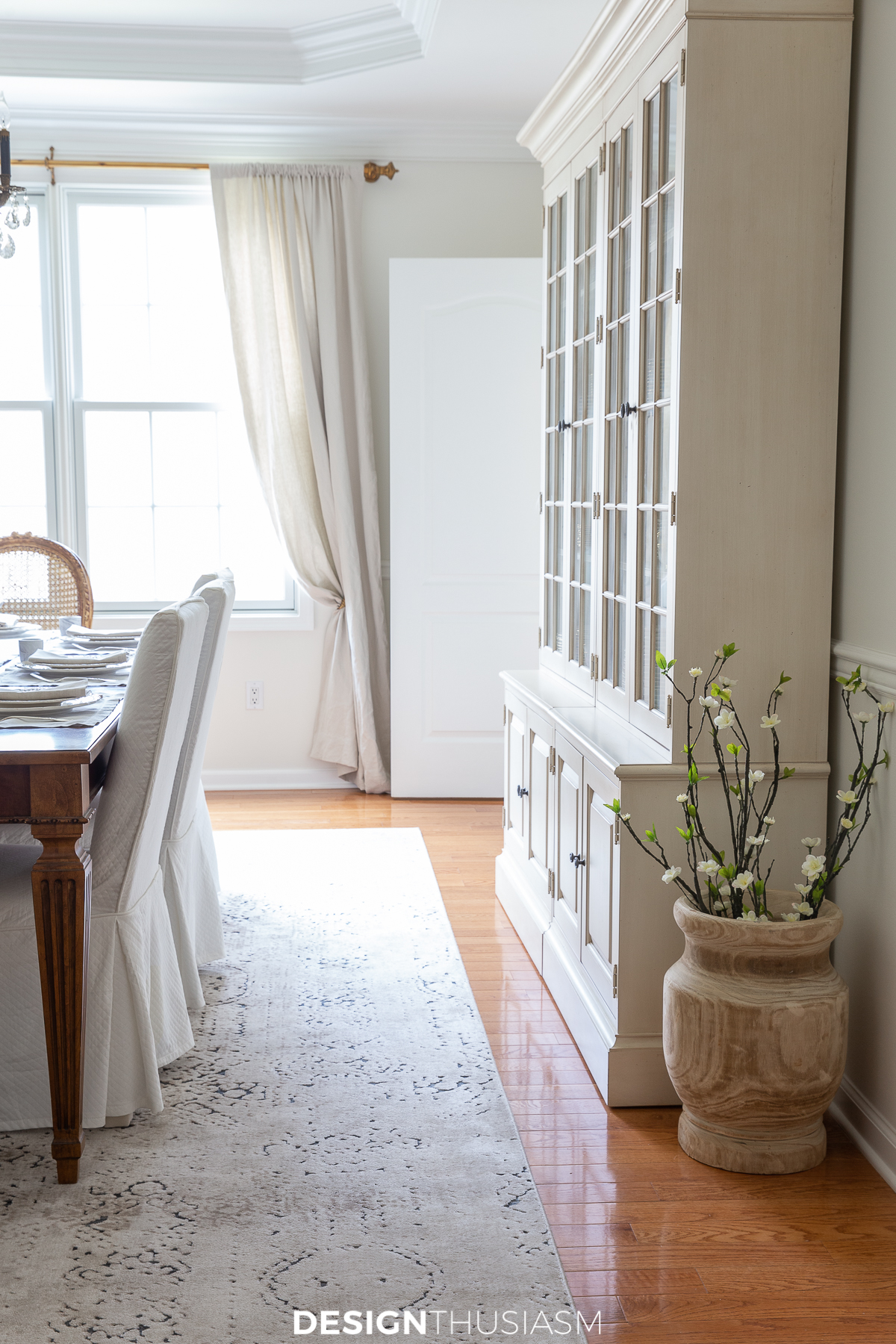 dining room china cabinet with wood vase