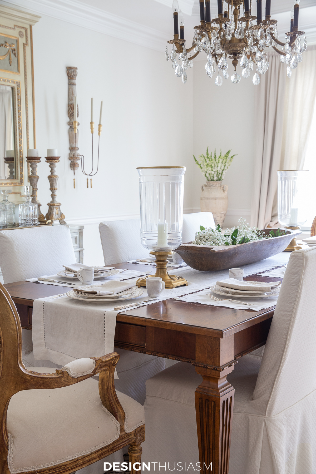 dining room table with hurricane lamps