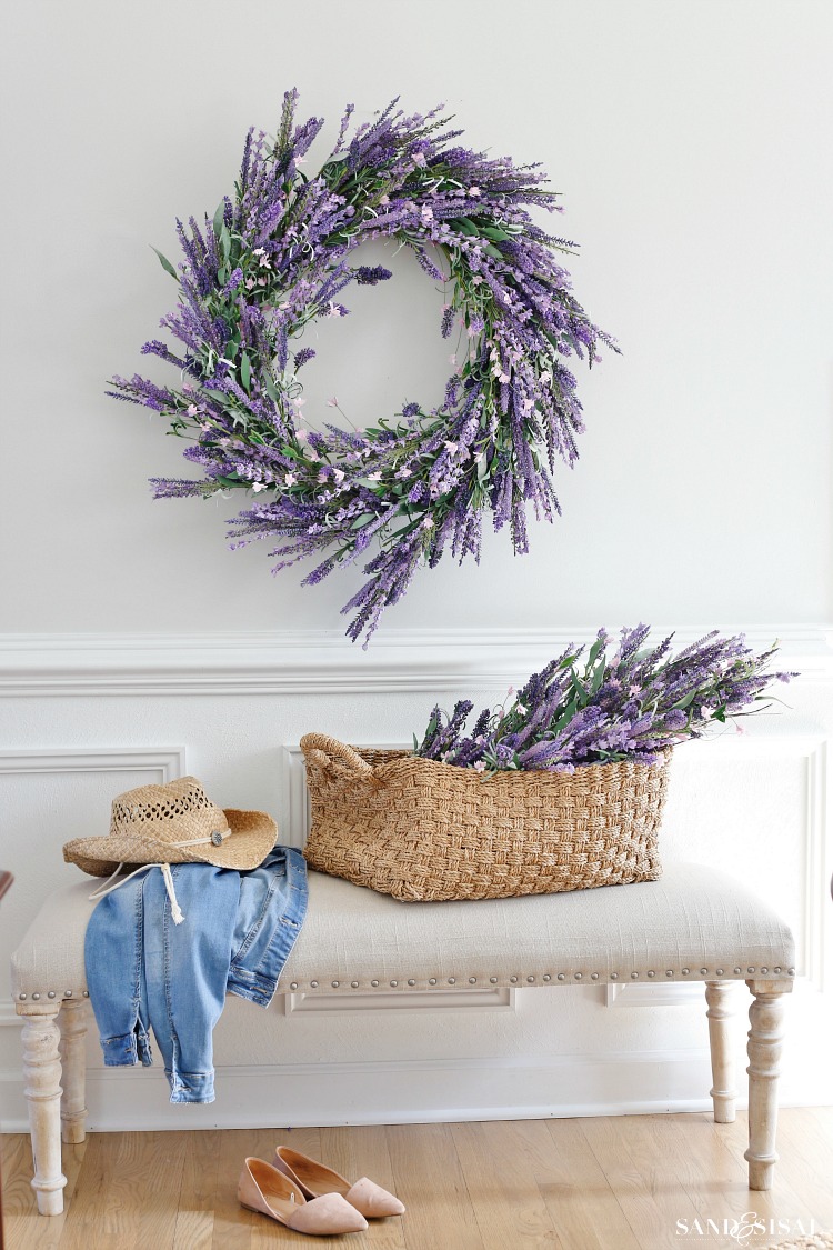 lavender wreath and basket on a bench