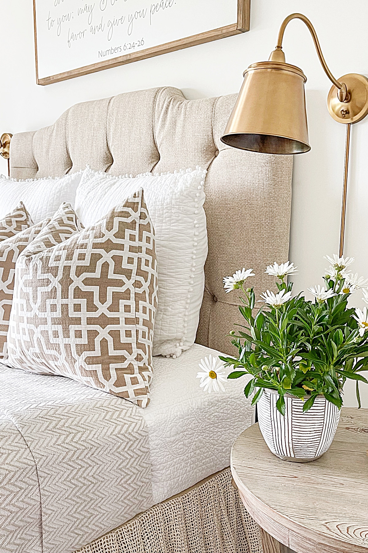 pillows and flowers in the golf guest bedroom