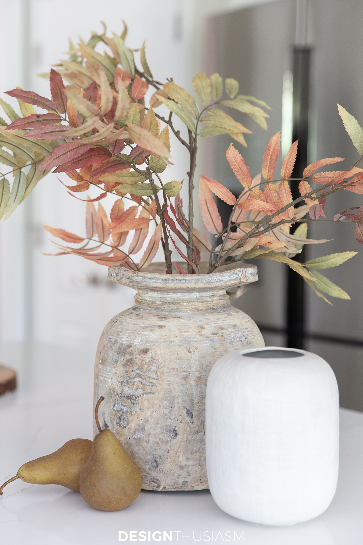 fall branches in a vintage wood vase