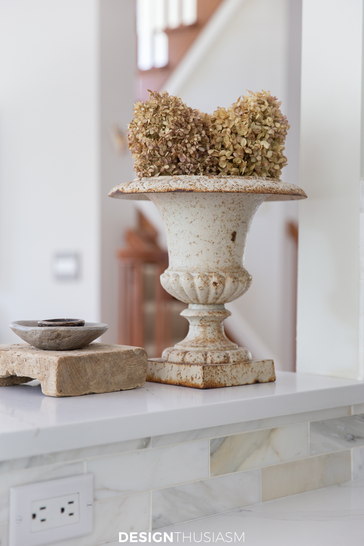 antique garden urn with hydrangeas