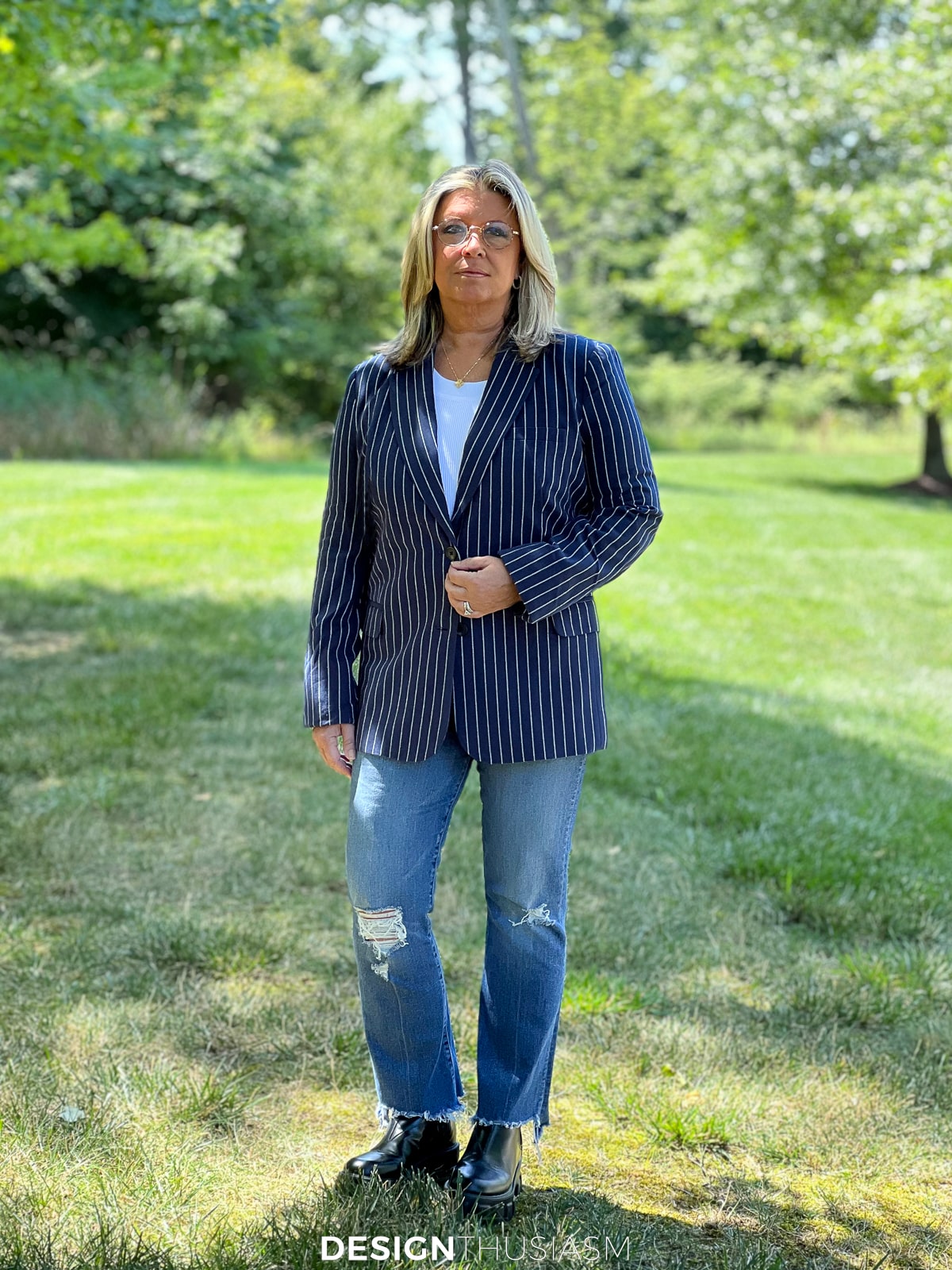 pinstripe jacket with white tank and light ripped jeans
