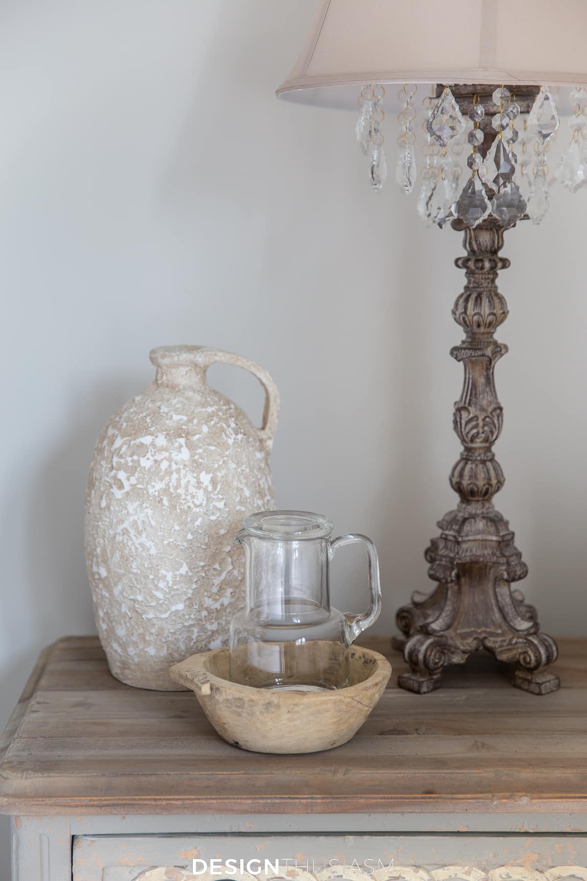 guest room nightstand with water