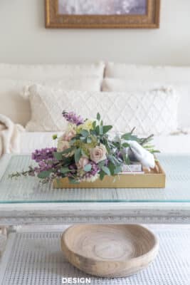 off white living room with floral bouquet