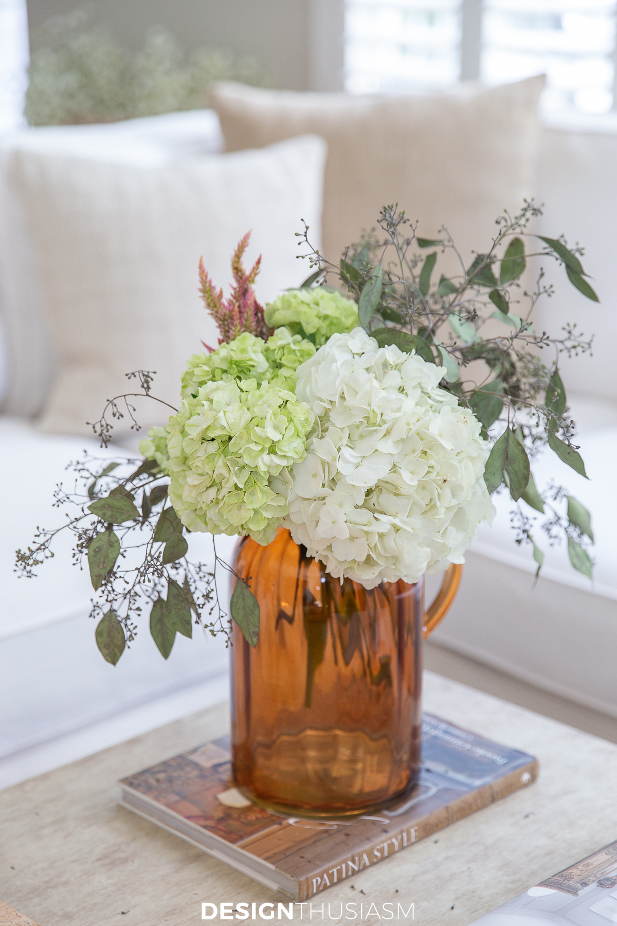 hydrangeas in amber glass vase