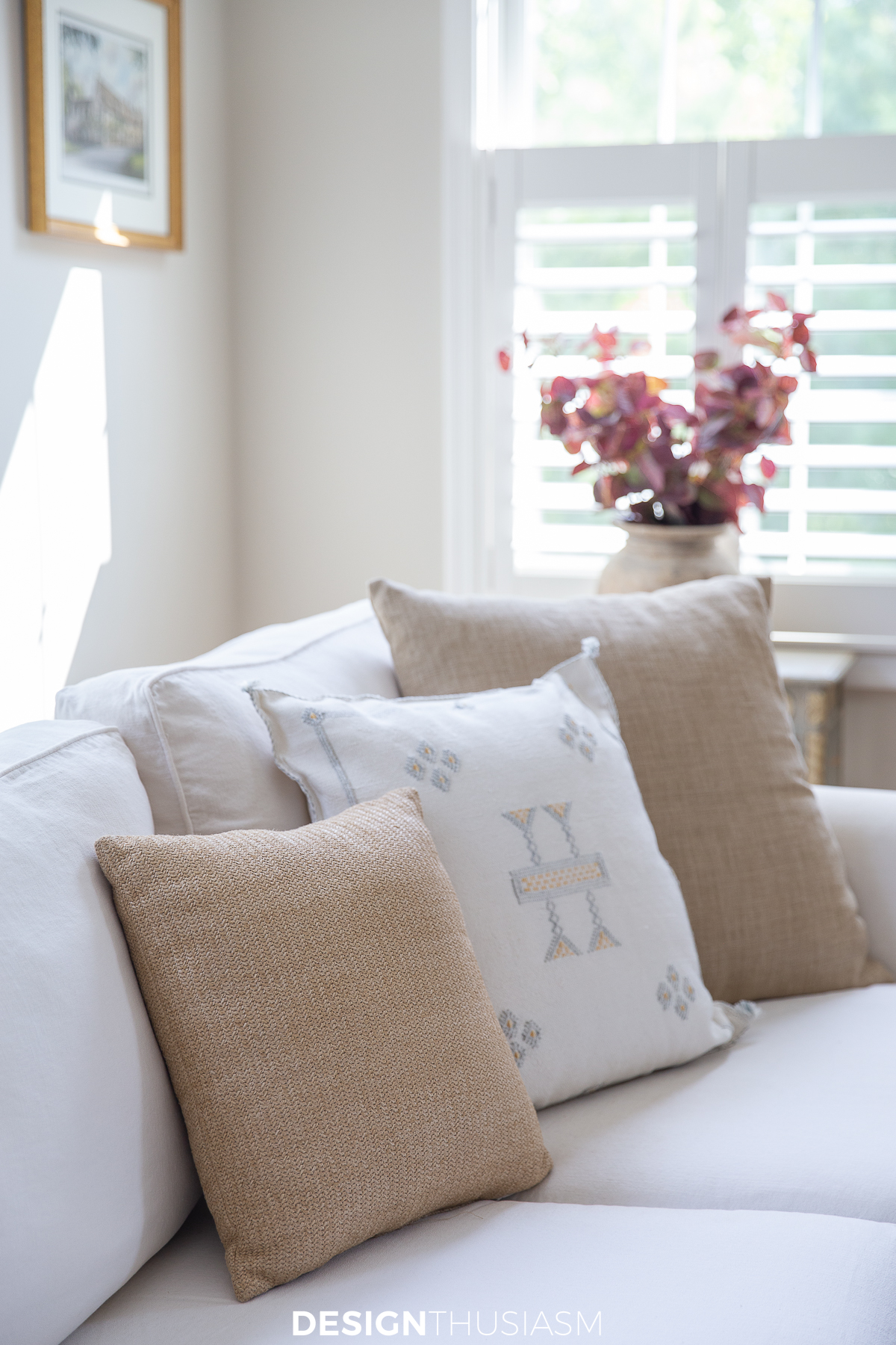 neutral fall pillows on the sofa