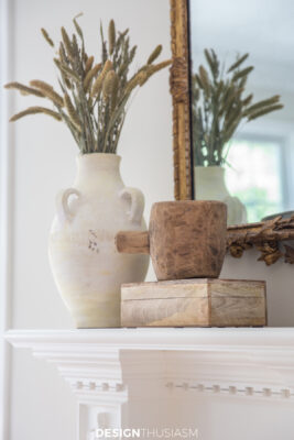 fall branches in vase on the mantel