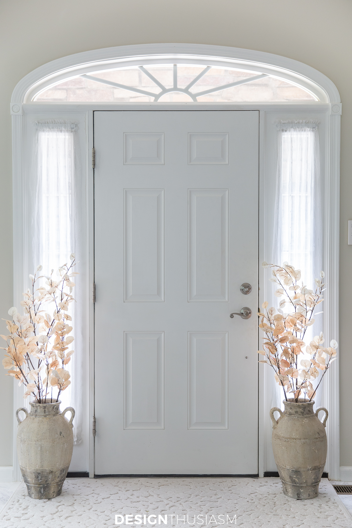 Front door with fall branches