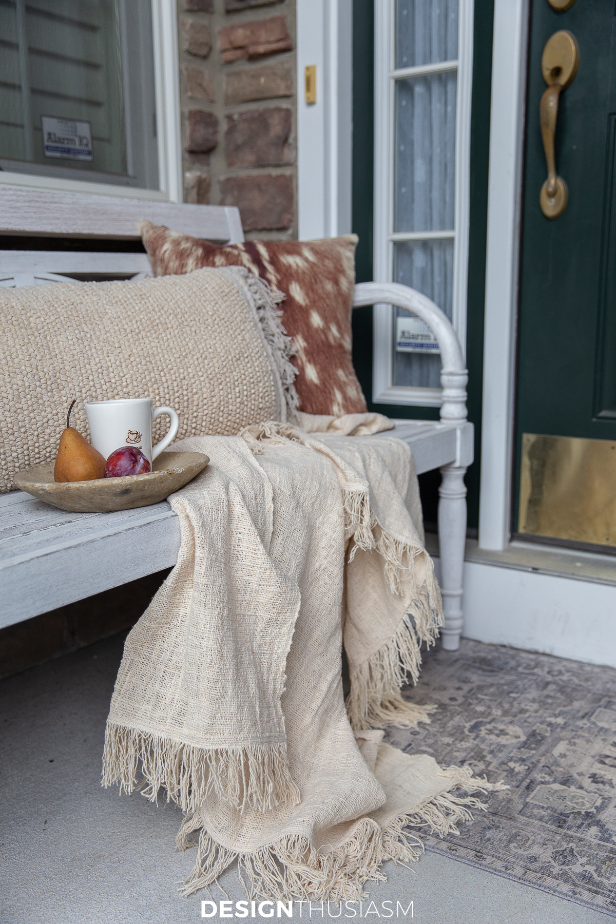 Fall pillows and throw on a bench