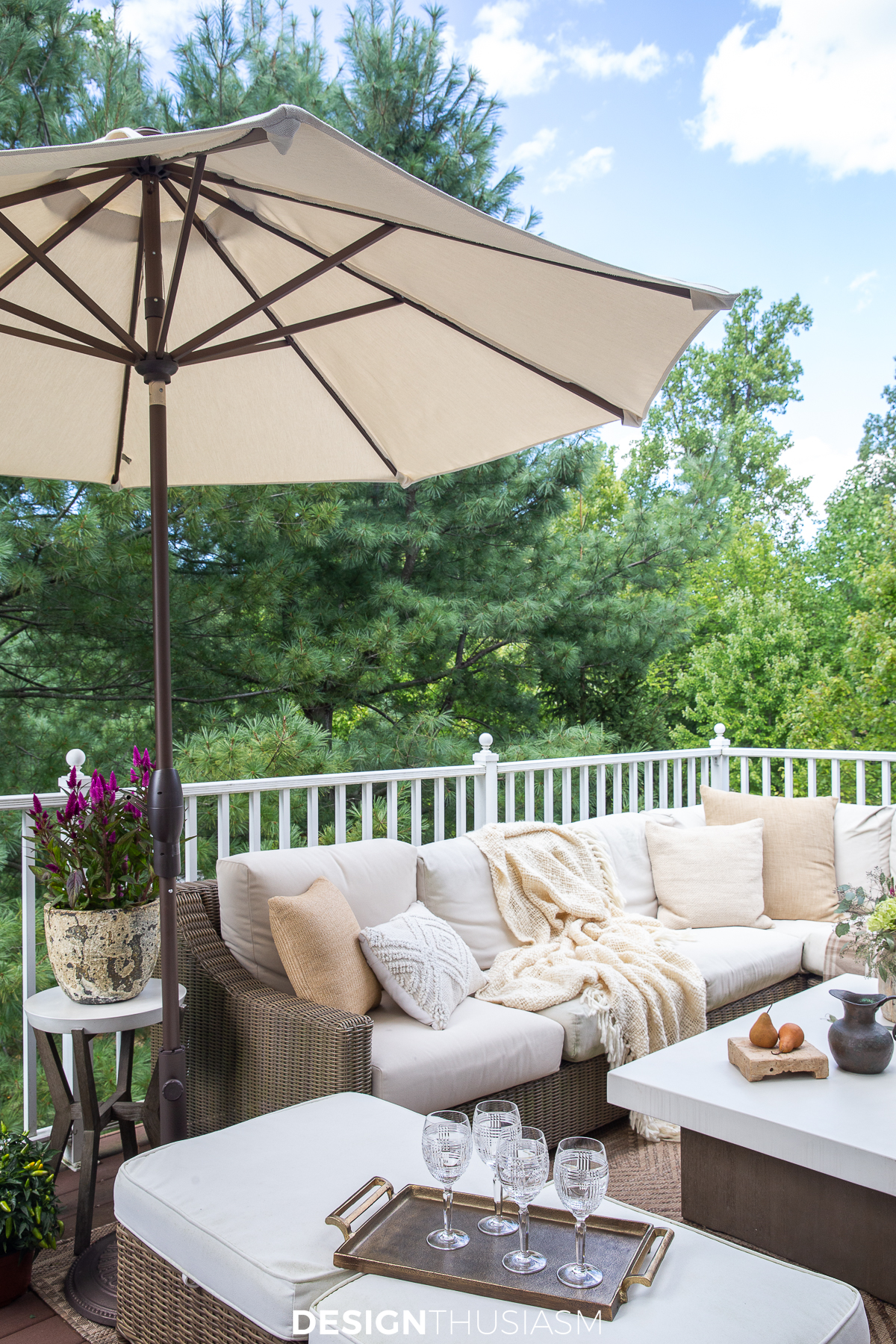 small patio with umbrella