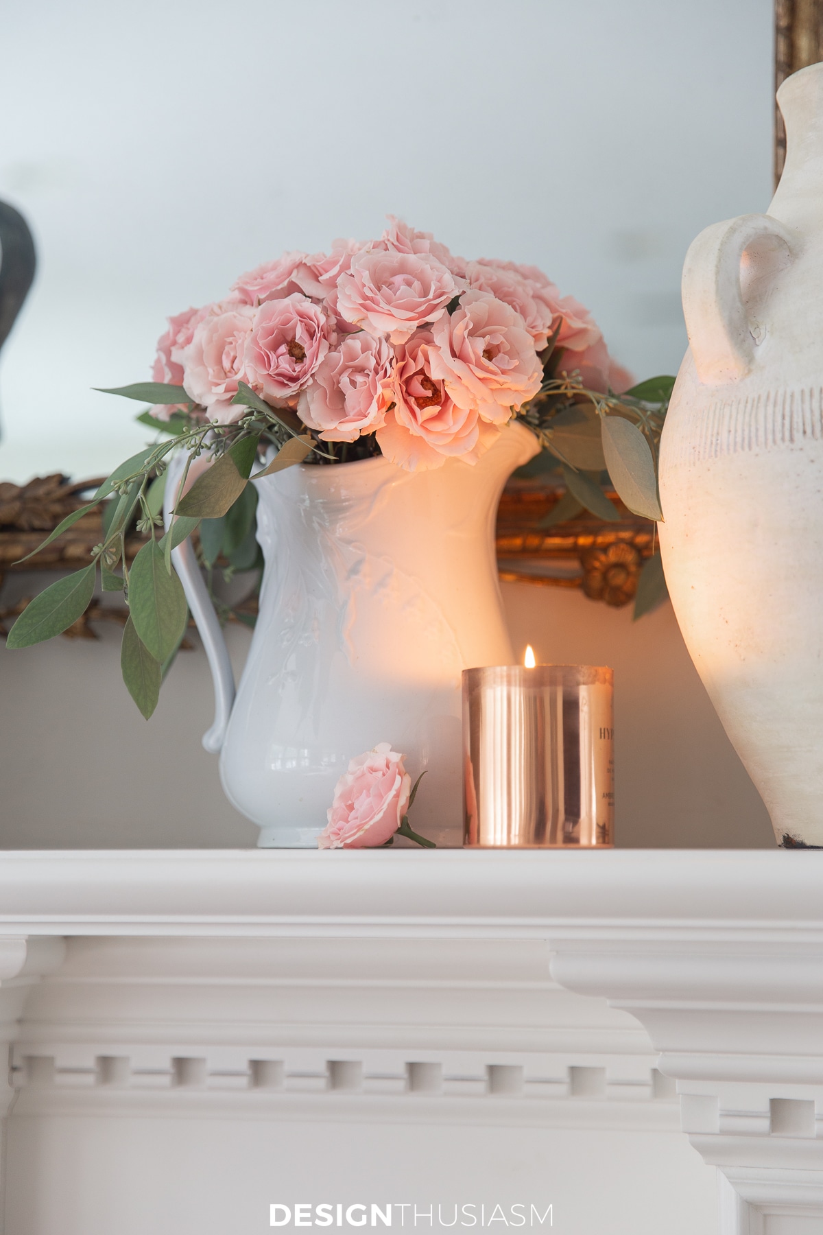 copper candle and blush pink mini roses