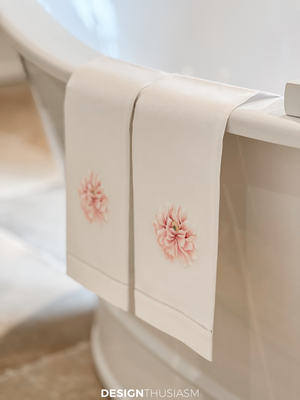 floral linen tea towels over the tub