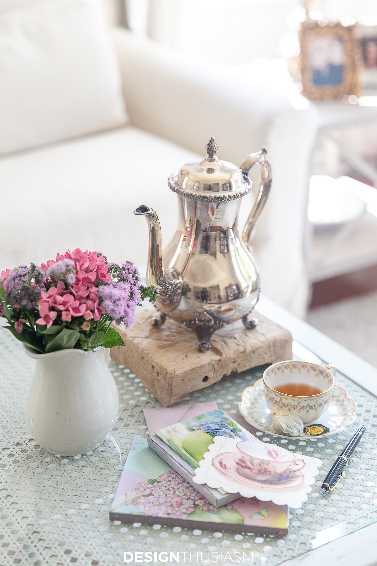 note cards and silver teapot
