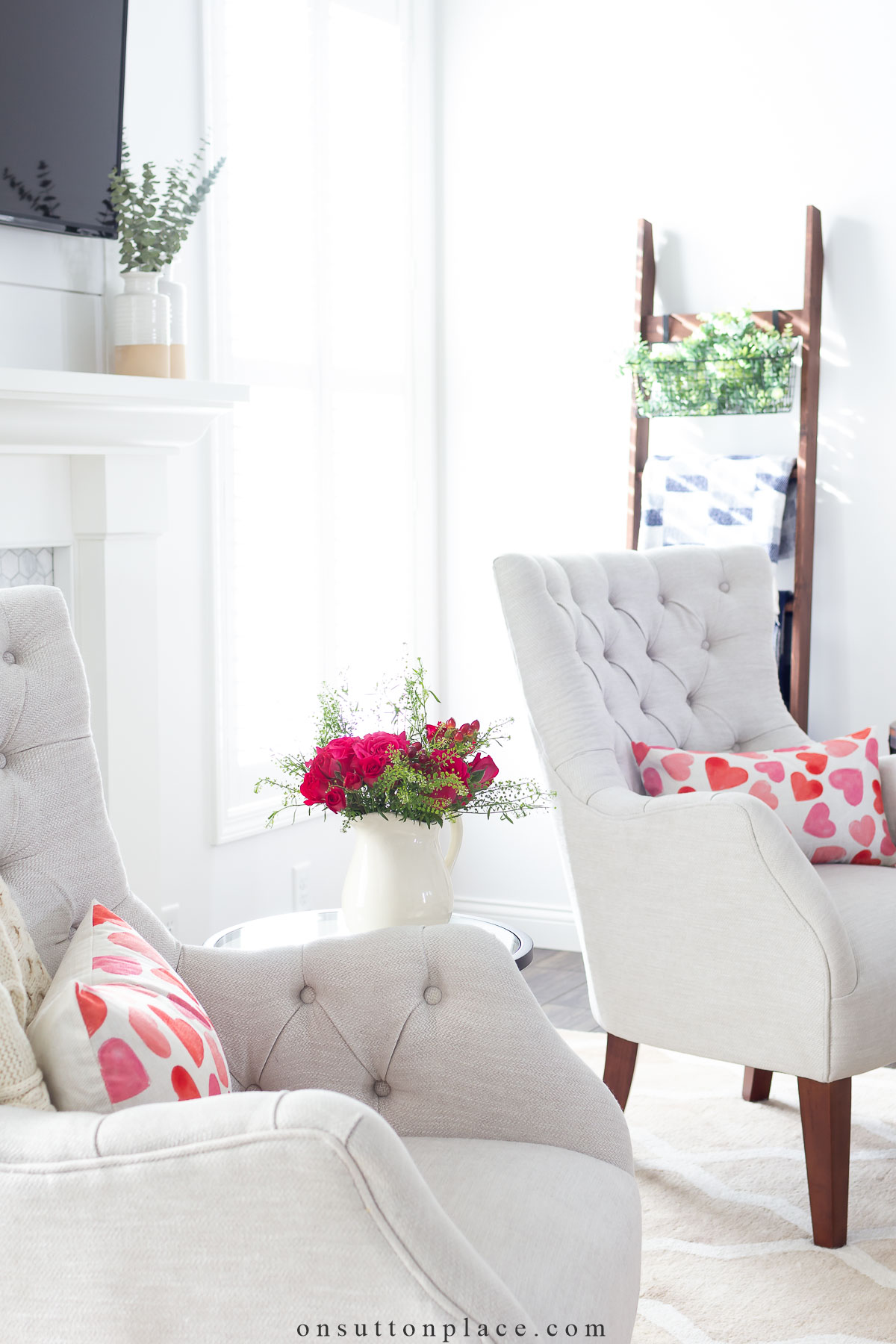 valentines day ideas heart pillows on tufted chairs