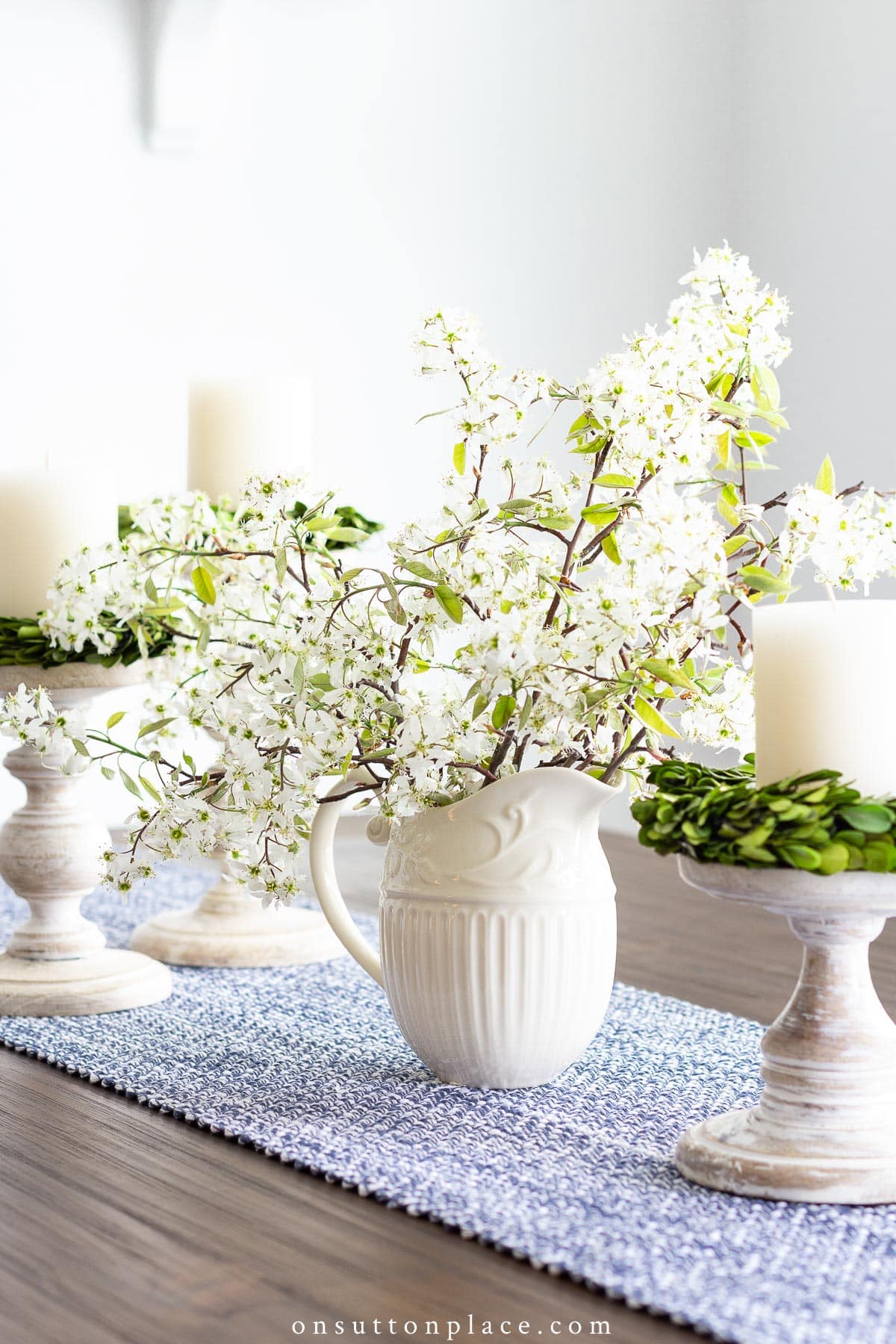 dining nook table with pitcher of flowers