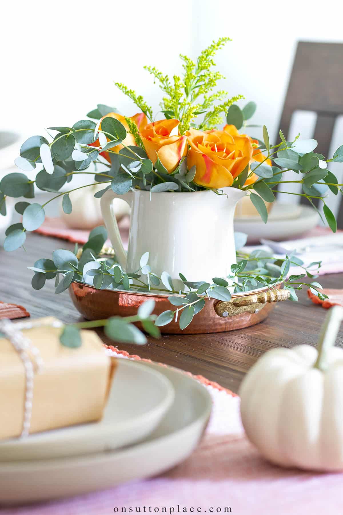 fall flower arrangement on table 2022